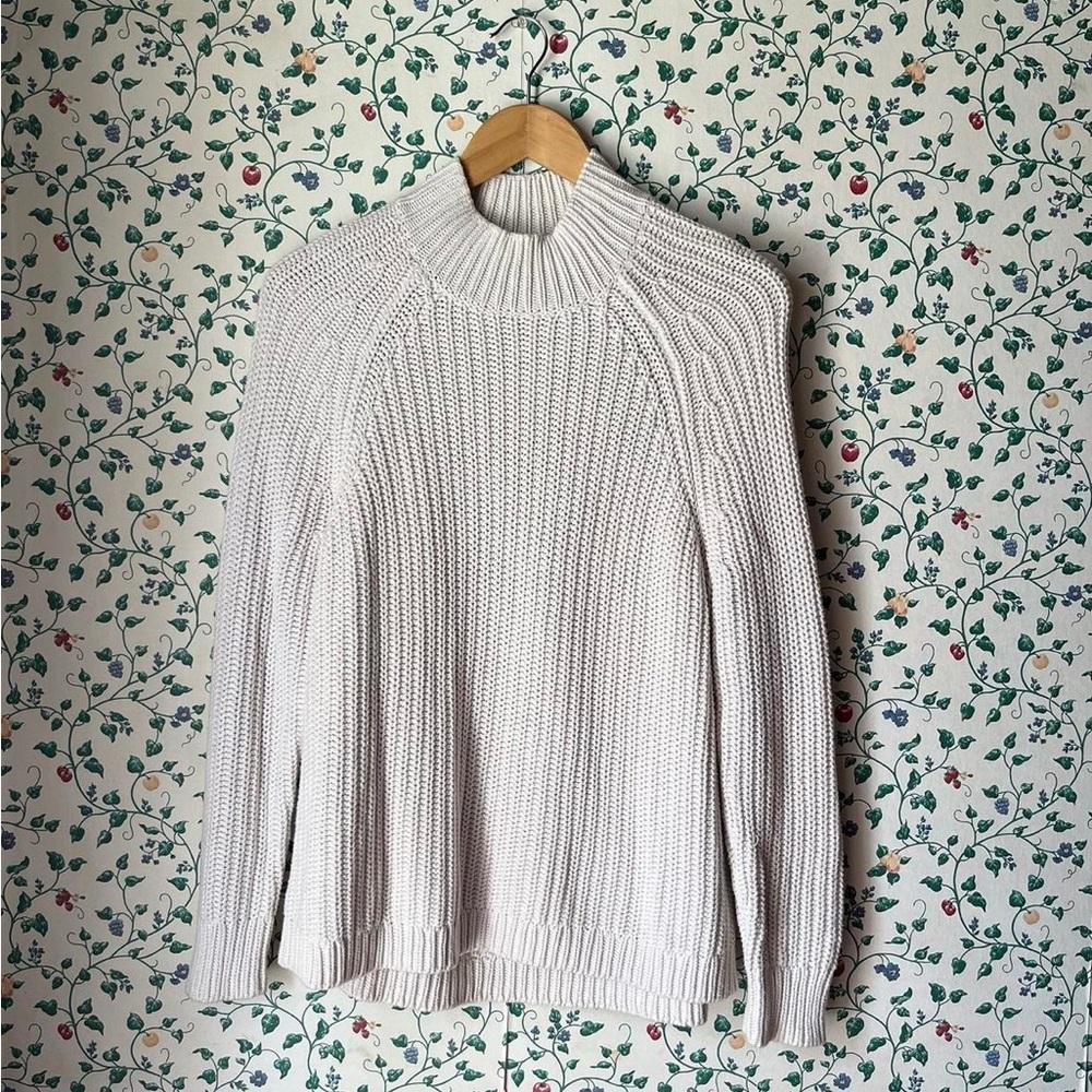 Open back turtleneck sweater by Kendall and Kylie